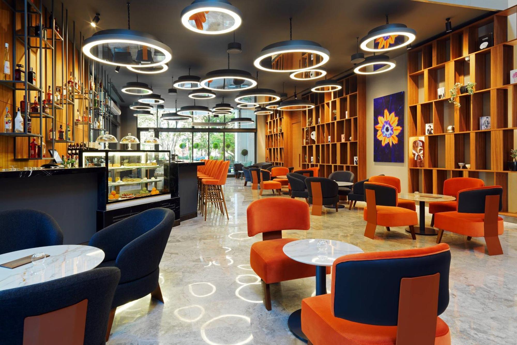 Sheraton Batumi Hotel Екстериор снимка The interior of a Starbucks Reserve store in Shanghai, China