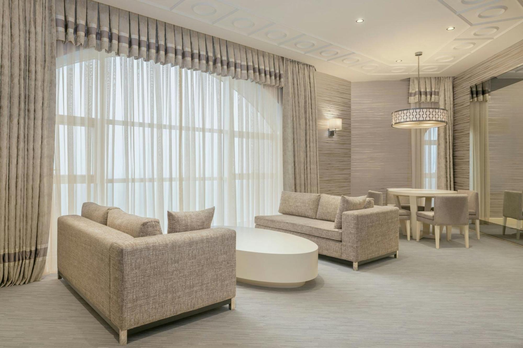 Sheraton Batumi Hotel Екстериор снимка A living room with a large window