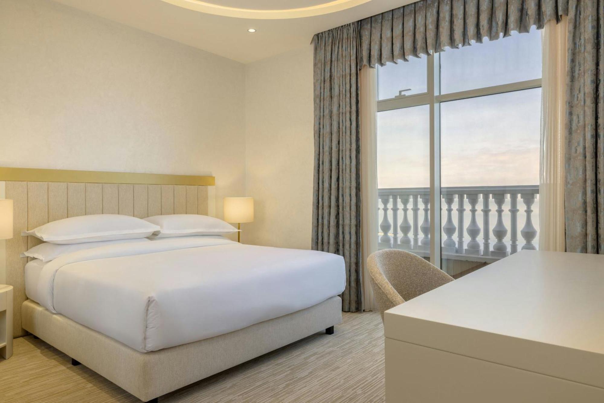 Sheraton Batumi Hotel Екстериор снимка A bedroom at the hotel
